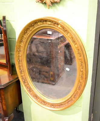 Lot 1207 - Victorian oval gilt mirror