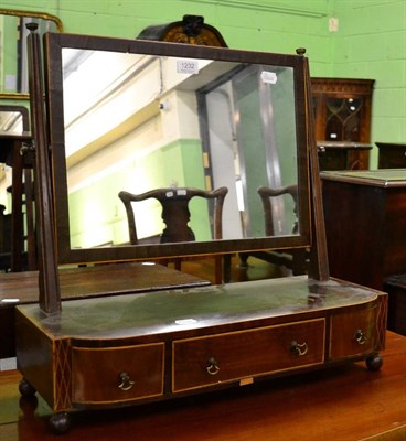 Lot 1232 - A 19th century mahogany toilet mirror with three drawers