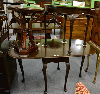 Lot 1240 - A 1920's mahogany fold over card table and a mahogany drop leaf table