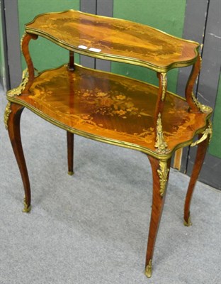 Lot 1244 - A 19th century French inlaid kingwood two tier occasional table, with gilt metal mounts