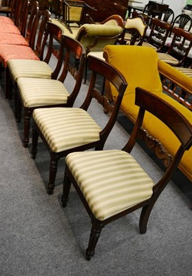 Lot 1272 - A set of four mahogany rail back dining chairs