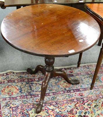 Lot 1284 - A 19th century mahogany tripod table