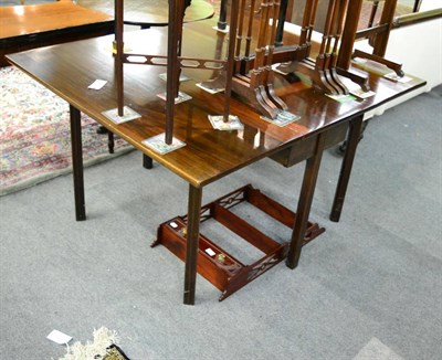 Lot 1286 - A 19th century mahogany drop leaf table