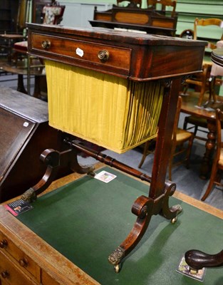 Lot 1294 - A Regency mahogany work table