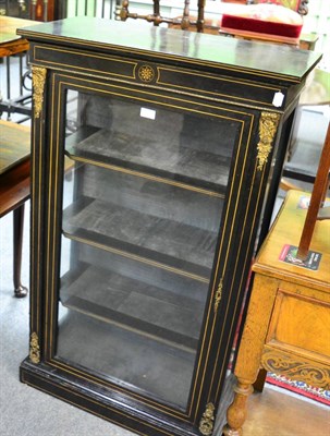 Lot 1298 - A 19th century ebonised and ormolu mounted display cabinet, and a rosewood two tier side table