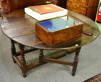 Lot 1326 - A 19th century oak gate leg table