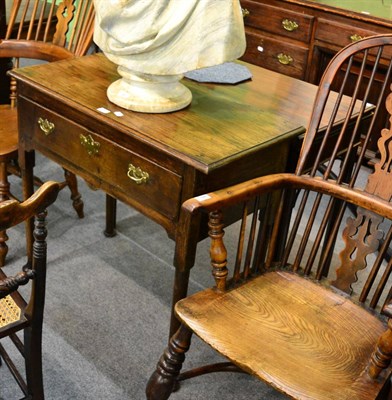 Lot 1329 - A George II oak and elm side table with single drawer, on turned legs to pad feet