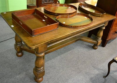 Lot 1332 - A Georgian style oak refectory table