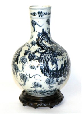 Lot 13 - A Chinese blue and white bottle vase with wood stand