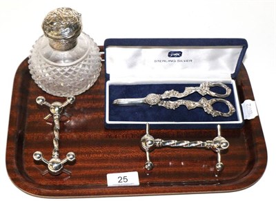 Lot 25 - A pair of Edwardian silver knife rests, Sheffield 1902; a Victorian silver hobnail cut glass...