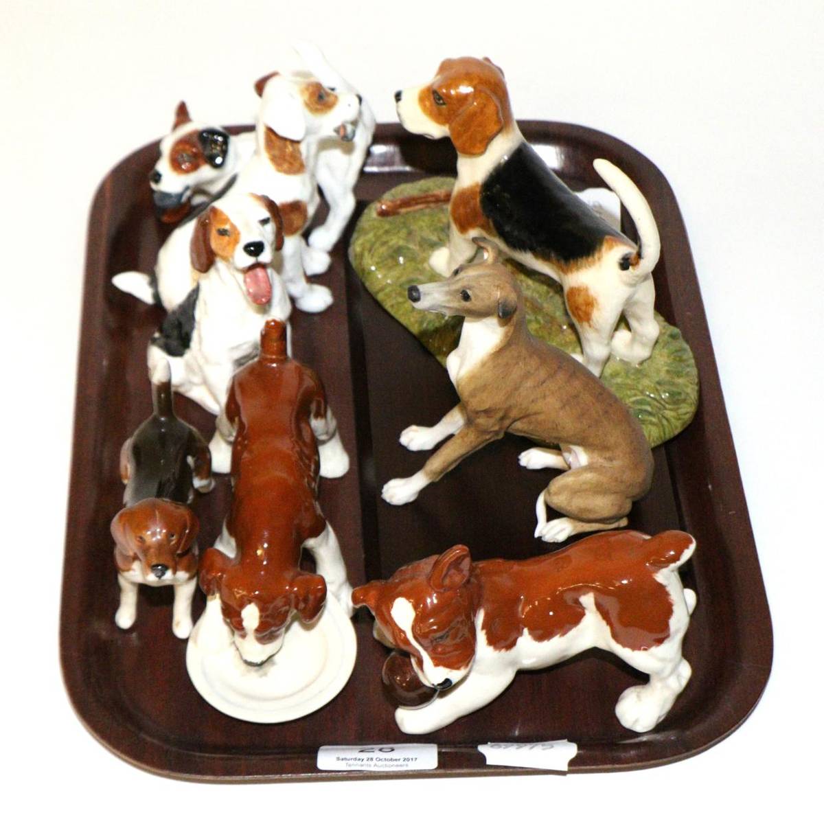 Lot 28 - Royal Doulton hounds, Beswick hounds and a model of a whippet (8)