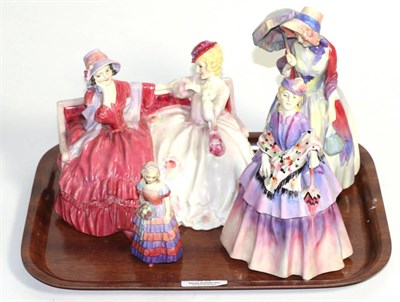 Lot 39 - Four Royal Doulton ladies including 'The Gossips' HN1499; 'Miss Demure' HN1560 and two others, some