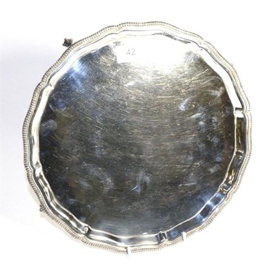 Lot 42 - A circular silver salver with gadroon border, Mappin & Webb, Sheffield, 1969, 30cm diam, 27.3ozt
