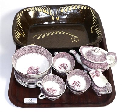 Lot 44 - Hackwood child's tea set and a slip ware dish