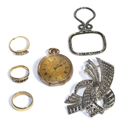 Lot 109 - A continental ladies fob watch stamped 9K, a marcasite brooch, three yellow metal rings and a small