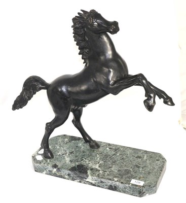 Lot 128 - Tommaso Campaiola (Italian) bronze model of a rearing horse, signed in cast on tail, on a green...