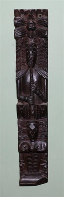 Lot 132 - A carved oak Term figure, 17th century, as a musician playing pipes over a mask and scroll,...