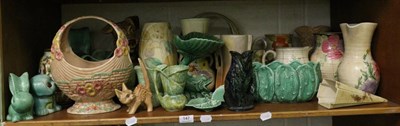 Lot 147 - A shelf of 20th century ceramics including Sylvac, Beswick, Dartmouth, Bradford, etc