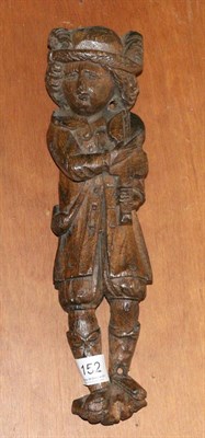 Lot 152 - A Flemish oak figure of a musician, 17th century, standing holding a violin, 31.5cm high