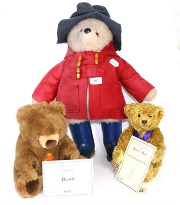 Lot 161 - Paddington Bear in red coat and blue Dunlop Wellington boots, 50cm high; together with two...