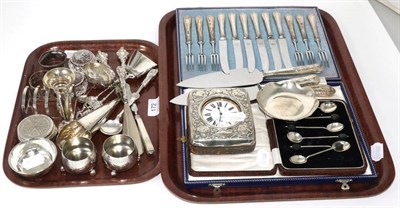 Lot 172 - A group of silver including cased silver handled fruit knives and forks, toast rack, salts,...