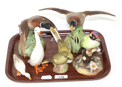 Lot 178 - Two Spode models of mallards in flight, a Royal Crown Derby green woodpecker signed P K...