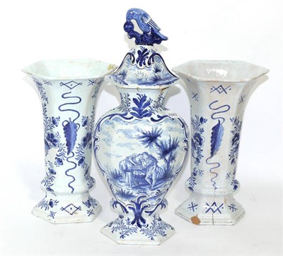 Lot 184 - A composite garniture of 19th century delft vases