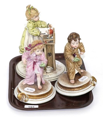 Lot 191 - A Capodimonte La Pappa Della Bambolina by Tiziano Galli together with Candle Boy by Bruno Merli and