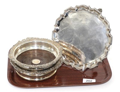 Lot 202 - A small silver salver, Thomas Bradbury & Sons, London 1913; and a pair of Old Sheffield plate...