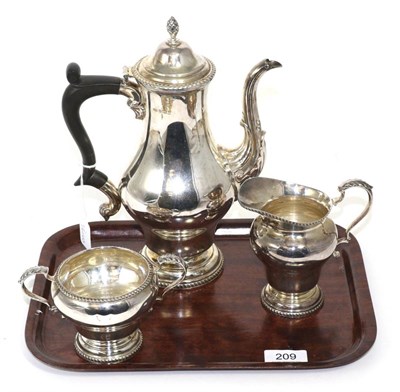 Lot 209 - A three piece silver coffee service, Mappin & Webb, Birmingham 1968, the coffee pot of 18th century