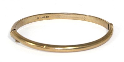 Lot 233 - A 9 carat gold bangle