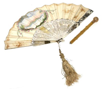 Lot 235 - A mother of pearl fan with carved sticks and paper mount, decorated with a pastoral scene,...