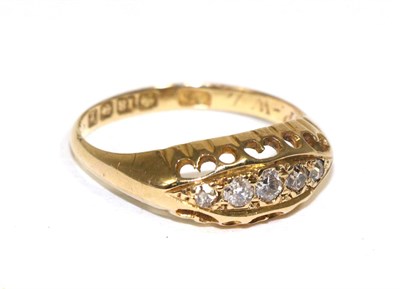 Lot 238 - An 18 carat gold five stone diamond ring