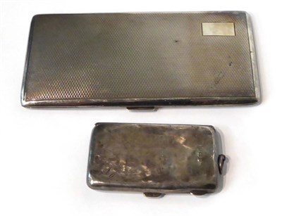 Lot 244 - A large silver cigarette case with engine turned engraving; and a silver purse, lacking fitted...