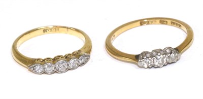 Lot 255 - A diamond half hoop ring and a diamond three stone ring (2)