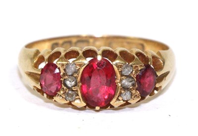 Lot 262 - An 18 carat gold ruby and diamond ring (1)