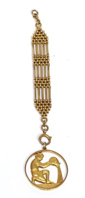 Lot 274 - A 9 carat gold medallion on a gate link chain