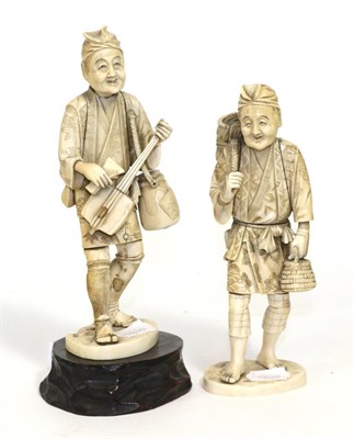 Lot 276 - Two Japanese Meiji period okimono of a musician and a fisherman