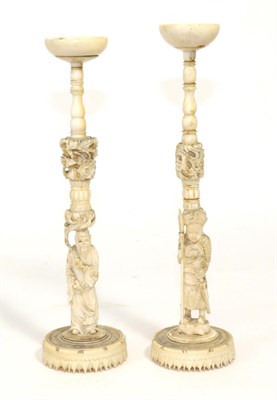 Lot 286 - Two Japanese Meiji period ivory figural puzzle ball stands (a.f.)