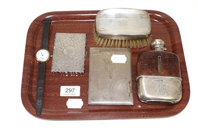 Lot 297 - A small group of silver including a card case, cigarette case, hip flask with leather...