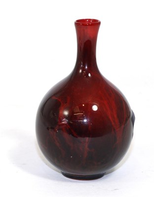 Lot 310 - A Royal Doulton flambe ware miniature bottle vase, printed factory marks, 11cm