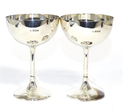 Lot 311 - A pair of silver goblets