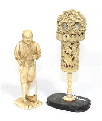 Lot 315 - Chinese carved ivory puzzle ball on stand and a Japanese carved ivory okimono (2)