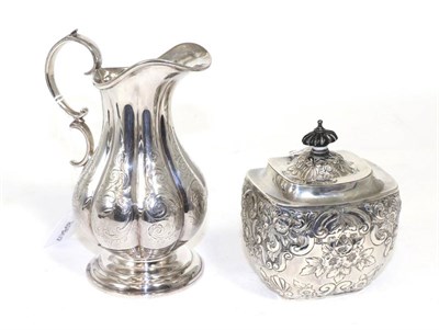 Lot 329 - A late Victorian silver tea caddy, Birmingham, 1895, hinged lid, repousse decoration; together with