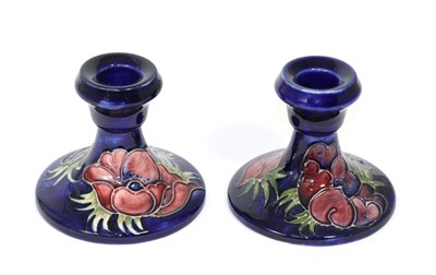 Lot 342 - A pair of modern Moorcroft Anemone pattern candlesticks