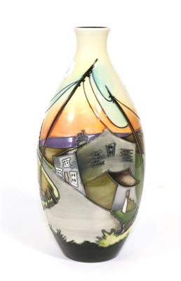 Lot 348 - A modern Moorcroft pottery vase, decorated with a cottage in a rural landscape by Kerry Goodwin for