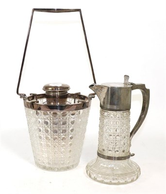 Lot 368 - A silver mounted claret jug and a silver plated cocktail shaker with cut glass ice bucket