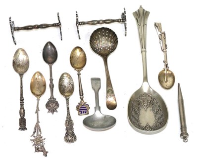 Lot 384 - A silver spoon, the handle in the form of a rifle; World's Columbian Exposition sterling spoon,...