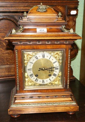 Lot 404 - A quarter striking table clock