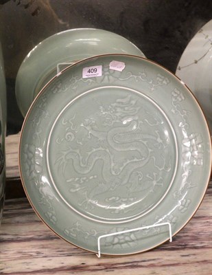 Lot 409 - A Chinese celadon porcelain shallow dish